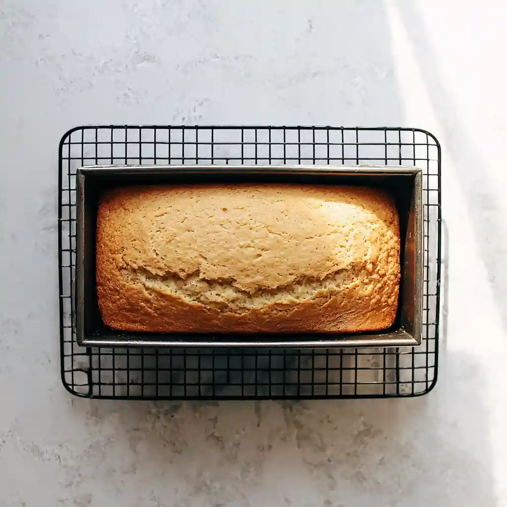 Ice Cream Bread Recipe – A Fun, Easy, and Delicious Treat 4 freshly baked ice cream bread loaf cooling in pan